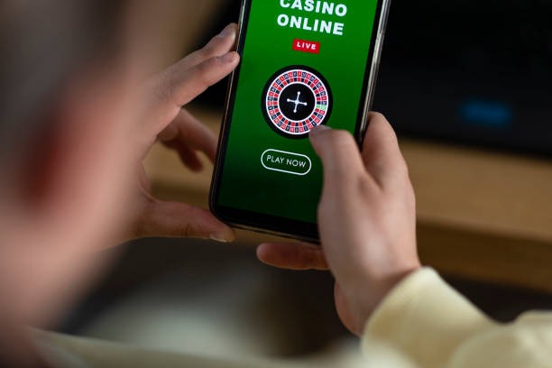 ayu app showing Free Play balance and live roulette table interface on mobile phone